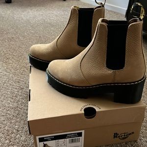 Brand new with tags Dr. Martens. Never been worn. With box included.